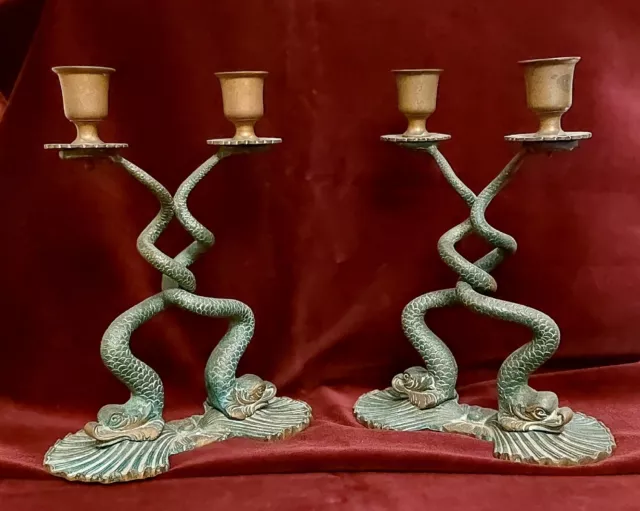 Coppia di candelabri In bronzo.