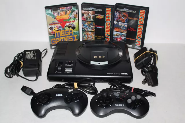 Lot console SEGA MegaDrive 1 " High Definition Graphics Stereo Sound " + jeux .