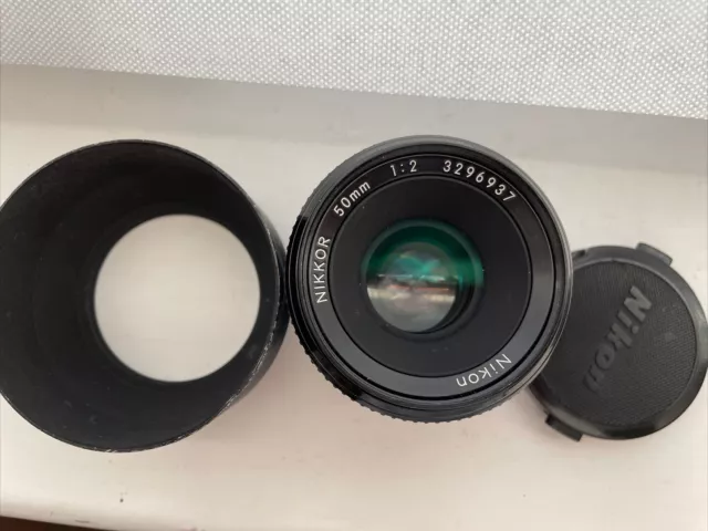 NEAR MINT | Nikkor pre-ai 50mm f2 | Comes with lens hood