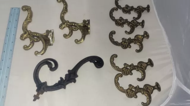 GROUP of 8 ANTIQUE CAST IRON BRASS  COAT RACK HOOKS  2 WITH LION HEADS