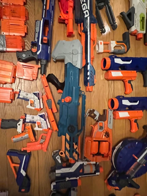 Huge lot of Nerf Guns, Blasters ,Magazines ,Scopes, Glasses etc.