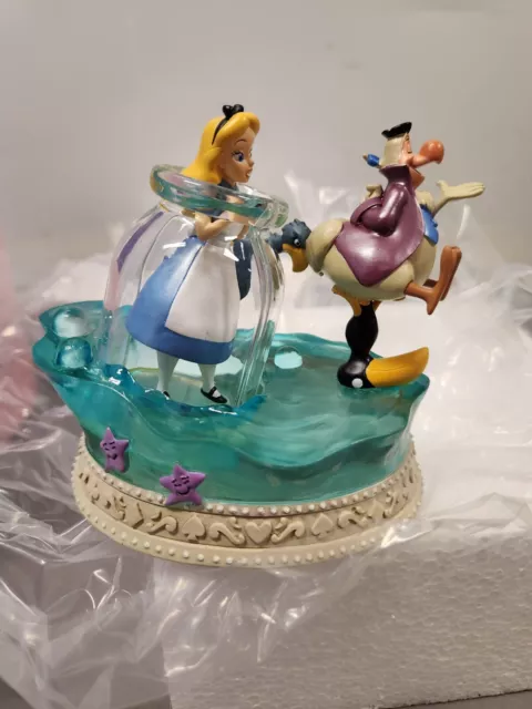 https://www.picclickimg.com/pdgAAOSw~MllWLqa/Disney-Store-JAPAN-Alice-in-Wonderland-70th.webp