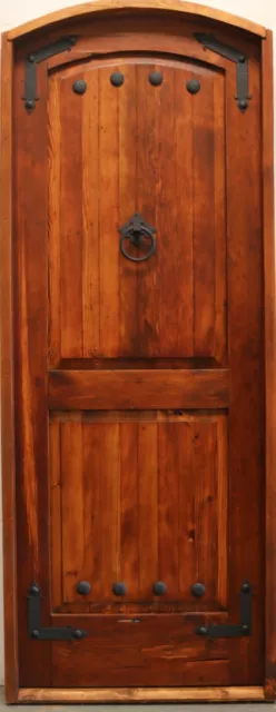 Rustic reclaimed lumber eye brow arched top door solid wood story book winery
