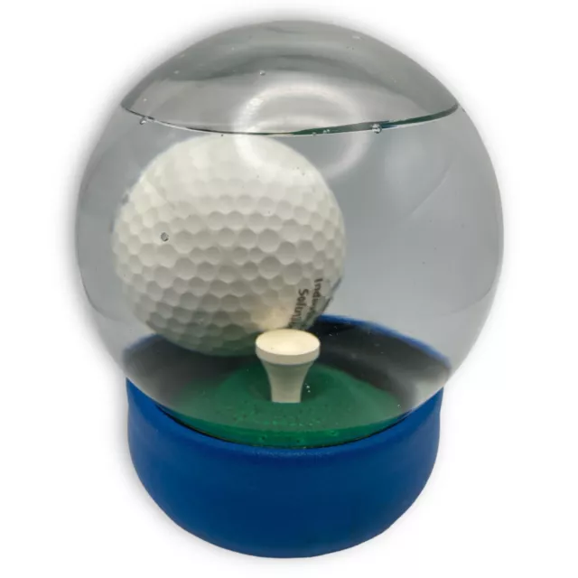 Camiseta azul globo de nieve con pelota de golf para hombre cueva mente juego desafío azul EE. UU.