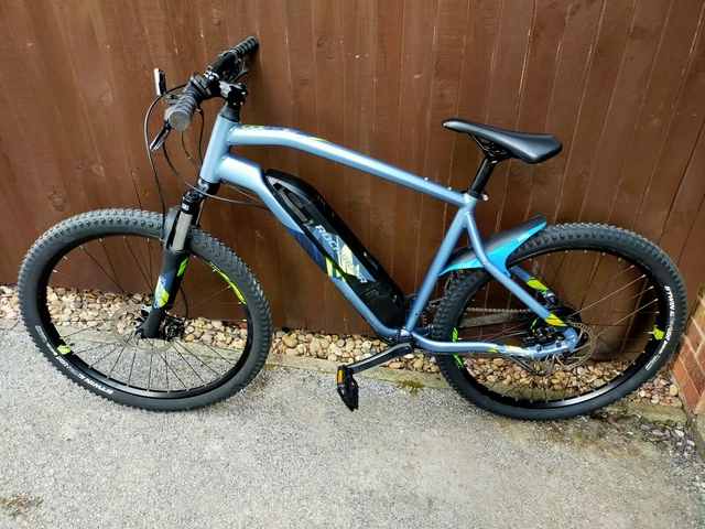 ROCKRIDER E ST 100 Electric Mountain Bike 27.5 wheels with