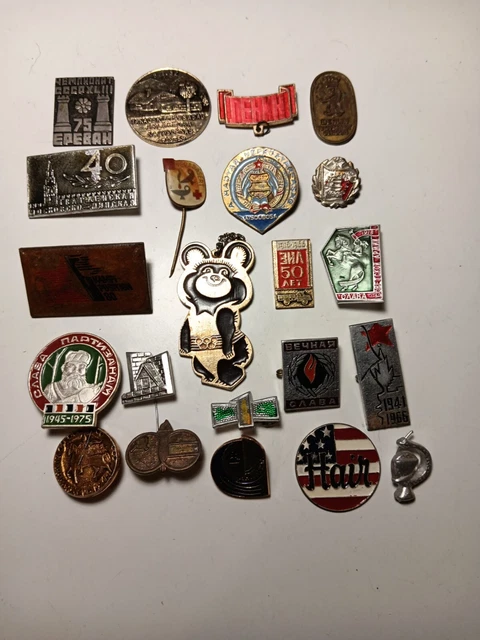 3 Soviet Union Pin and cap badges. A Soviet/Finnish Winter War badge with enamel detail and screw ba