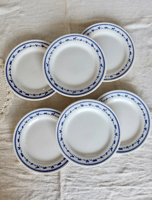 Ensemble de 7 assiettes à soupe Lustucru, motif à damier bleu, 1950/80 | €60