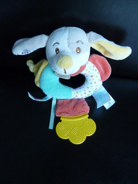 12/ Doudou Hochet Anneau Grelot Baby Nat Chien Bleu Jaune Rouge  Excellent Etat