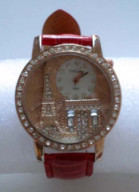 Montre fantaisie femme ou adolescente cadran décoré monuments parisiens & strass