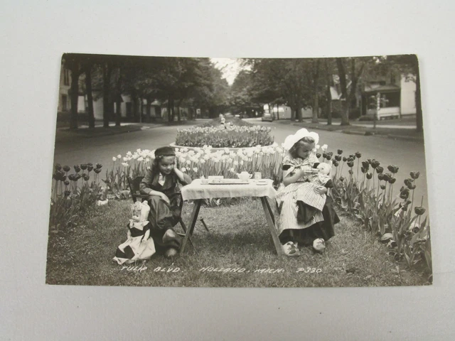 J1426 Postcard RPPC Tulip Blvd Holland MI Michigan girls playing with Dolls