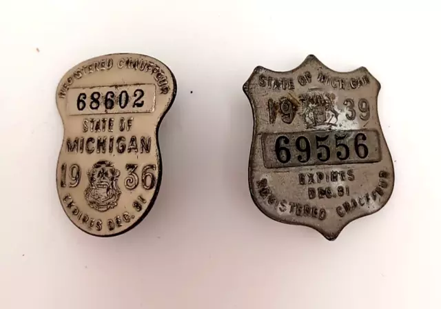 Pair of vintage State of Michigan pin on chauffeur badges years 1936 and 1939