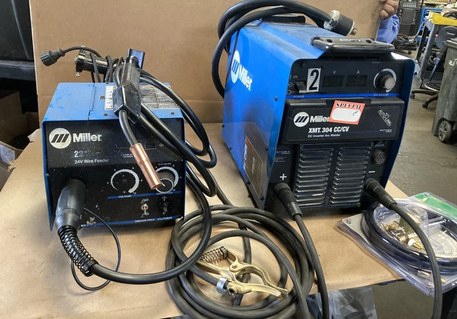 Miller XMT 304 CC/CV WITH 22 Wire Feeder  Refurbished With New Gun Flowmeter.035