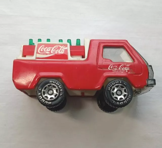 https://www.picclickimg.com/pjMAAOSwhadlRc7N/Vintage-Coke-1982-BUDDY-L-Coca-Cola-Delivery-Truck.webp
