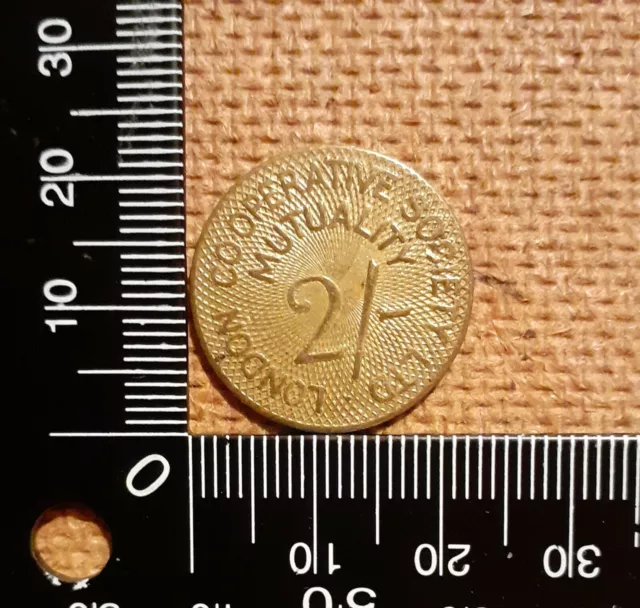 Old Co-op Used Token Coin - 2/-d London Cooperative Society Ltd Mutuality (a)