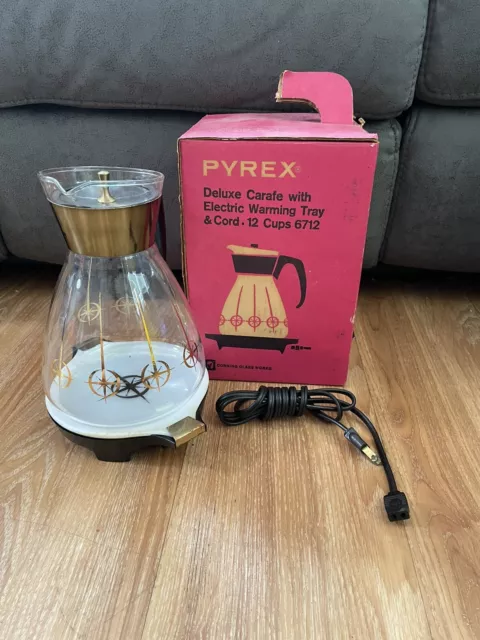 Vintage Pyrex deluxe carafe with electric warming tray compass design