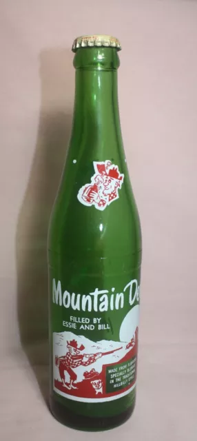 VINTAGE MOUNTAIN DEW  10 0z. Bottle WITH CAP Filled By: ESSIE AND BILL CANADA