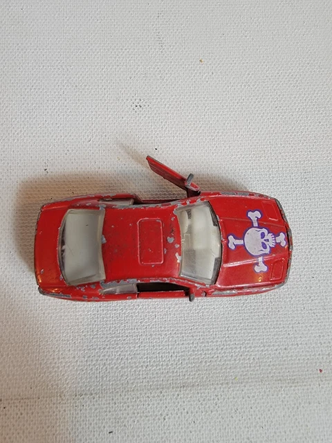 Vintage 1990s Diecast Toy Matchbox Ripper BMW 850i Red 1992 Skull Crossbones