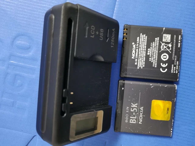 NOKIA BL-5k Battery AND universal charger for N85,N86 8MP,N87,C7,C7-00,C7-00S,X7