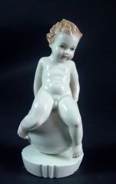 Rosenthal - nackter Putto auf Kugel