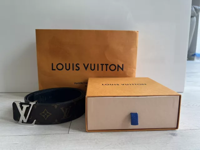 Louis Vuitton® Bimaterial Hooded Down Jacket Black. Size 50