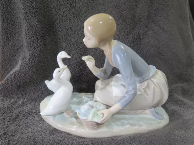 lladro Figurine, Feeding the Ducks, Retired #4849, perfect condition, no box