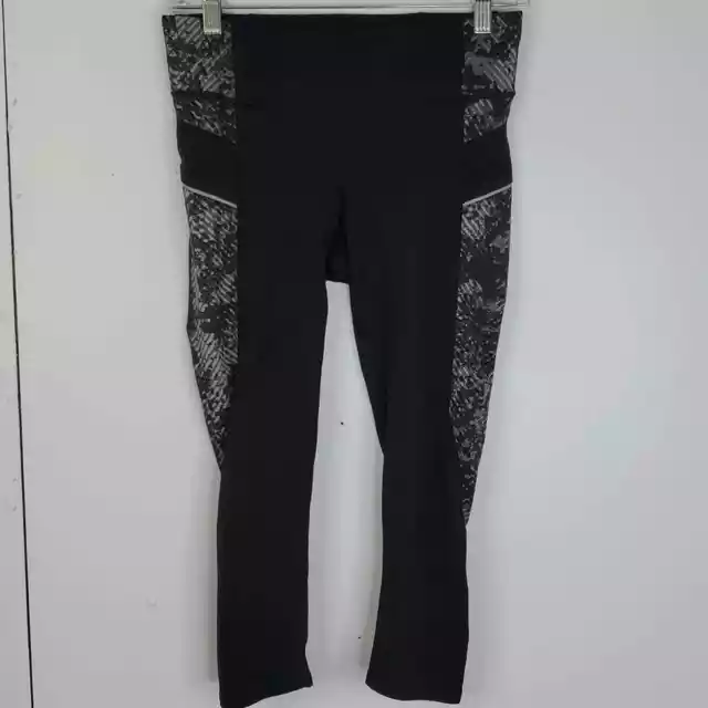 Athleta Revolve Stride Capri Leggings Zip Pocket Printed Sides Black XS womens