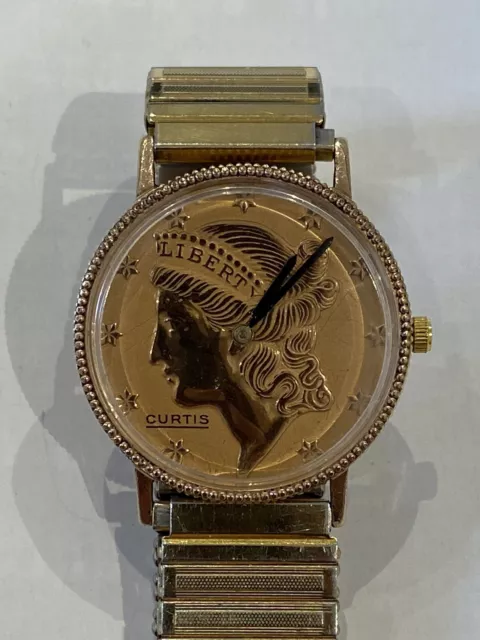 Vintage 1980’s Men’s Gold Watch “CURTIS” Liberty $20 Coin 17 Js Swiss Keeps Time Vintage 1980’s Men’s Gold Watch “CURTIS” Liberty $20 Coin 17 Js Swiss Keeps Time