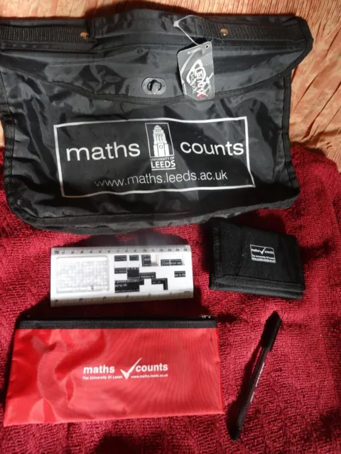 Black bag & small bundle of Maths Counts items-slide rule,pencil case,pen,wallet