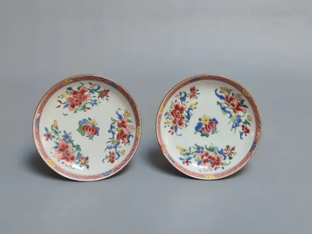 A pair of Chinese Famille Rose saucers Yongzheng (1723-1735)