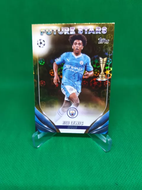 Rico Lewis Starball Gold 2023-24 Topps UEFA Club Comp Flagship Manchester City