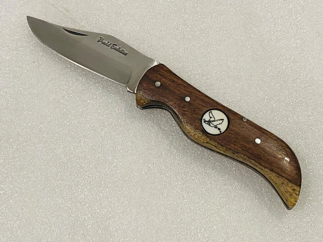 Couteau de poche berge Pradel évolution avec pastille canard.