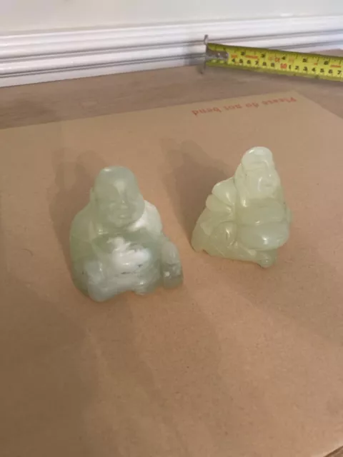 Two hand carved natural jade Buddhas