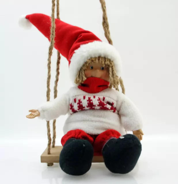 schöne große Kunstharz Puppe "Winterkind" Junge auf Schaukel Winter Deko