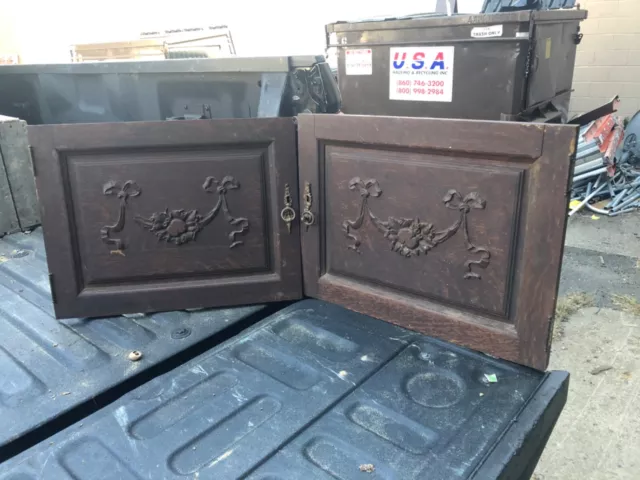 pair vintage quartersawn oak cabinet doors brass hardware carved panel 22 x 17”