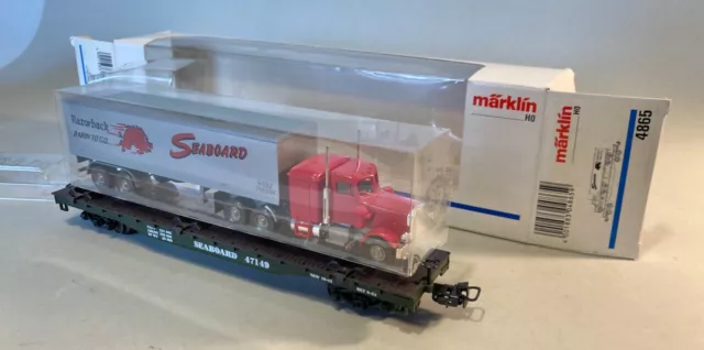 1 Stück Märklin 4865 Flachwagen SEABOARD 47149 , bel. mit US Truck