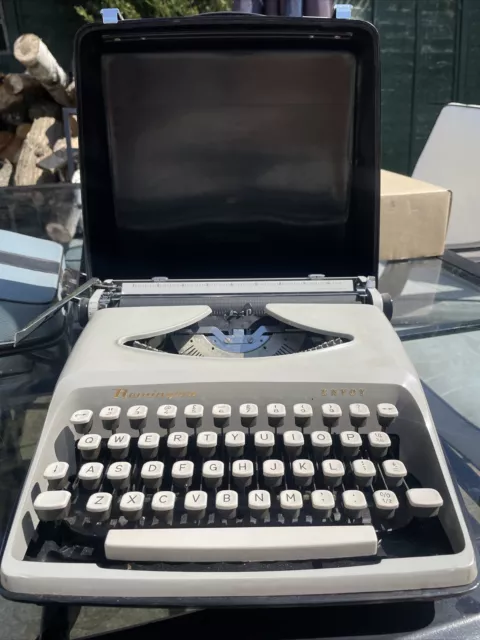 Máquina de escribir portátil vintage Remington Envoy + estuche rígido