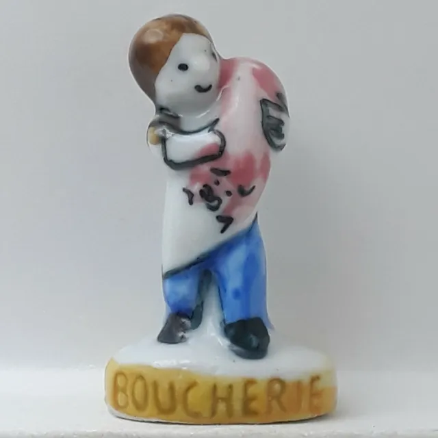 Fève Homme Boucherie en porcelaine Nordia 1995 (B21G)