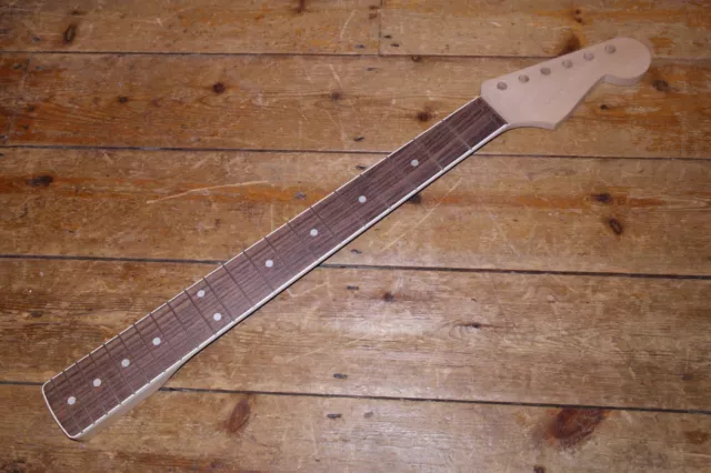 Allparts bound Strat neck licensed by Fender