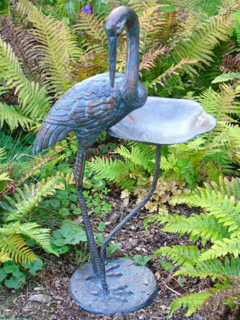 crane feeder garden ornament   .... cast in iron