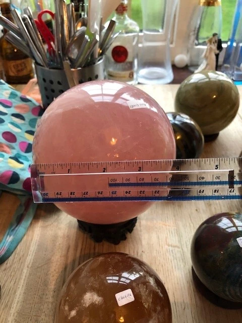 A collection of precious stone spheres, various sizes and weights. 