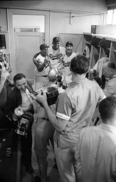Brooklyn Dodgers Don Newcombe posing for photograph with teammates - Old Photo