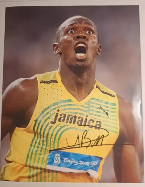 USAIN BOLT Olympics Gold Medal Winner Autographed 8 X 10 Inch Color Photograph