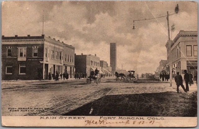 FORT MORGAN, Colorado Postcard MAIN STREET Downtown Scene / 1909 RPO Cancel