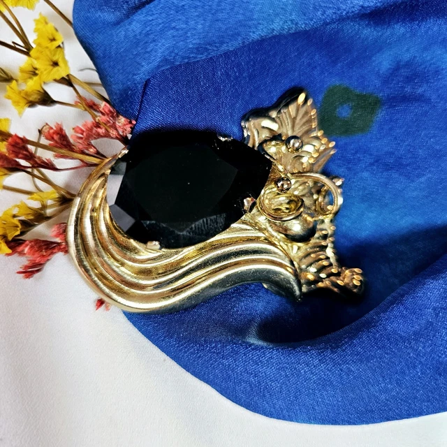 Grande broche vintage en métal doré à motif tourbillon étoilé - France