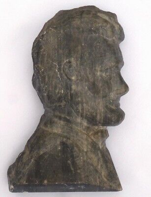 Very well done bust of Abraham Lincoln carved from dense stone.