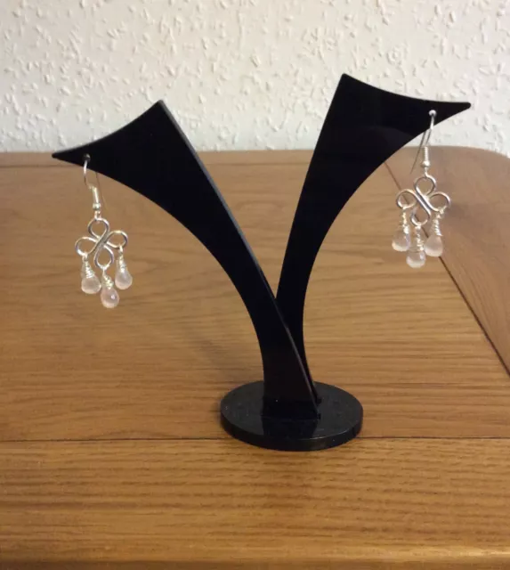 Rose Quartz Chandelier Earrings. Silver coloured earrings. Lotus themed