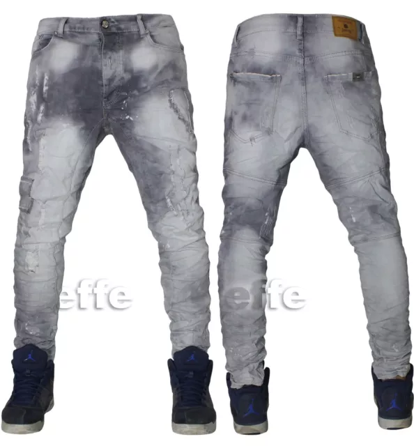 Jeans strappati cavallo basso uomo outlet