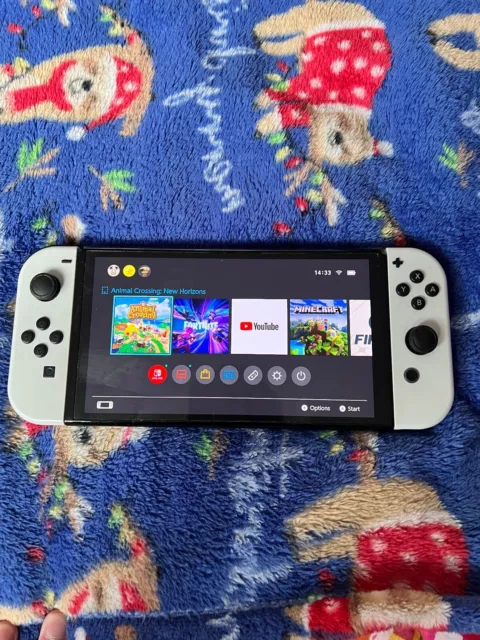 Nintendo Switch OLED White with Animal Crossing New Horizons Game