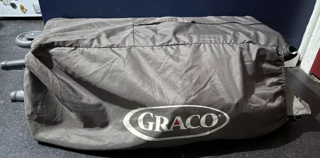 Graco Grey  Travel Cot 2 Wheels 105cm By 90cm By 72cm Approximately