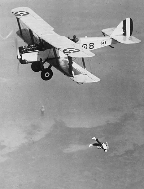 DOUBLE PARACHUTE JUMP Los Angeles Here is shown a remarkable phot ...